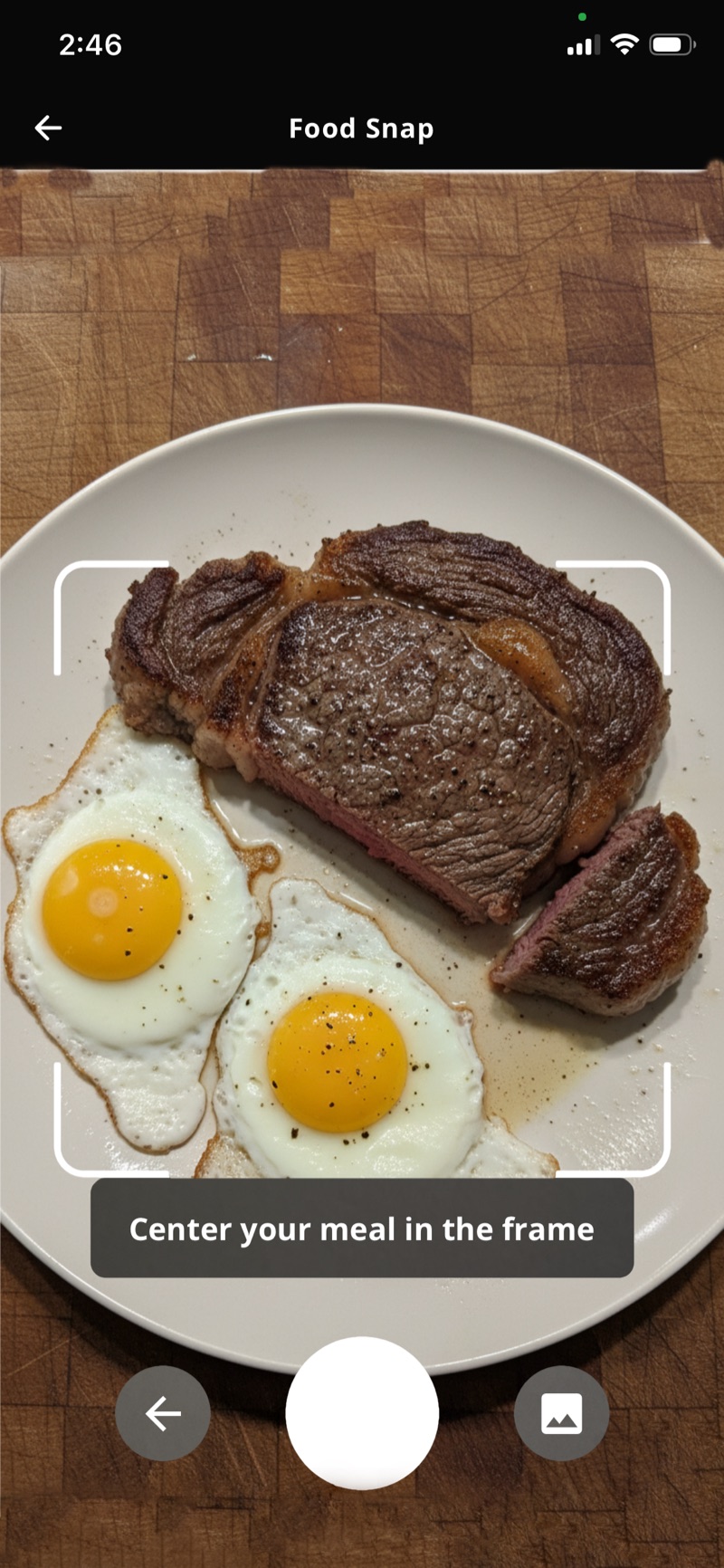 Vore Food Snap camera framing a ribeye steak and two eggs
